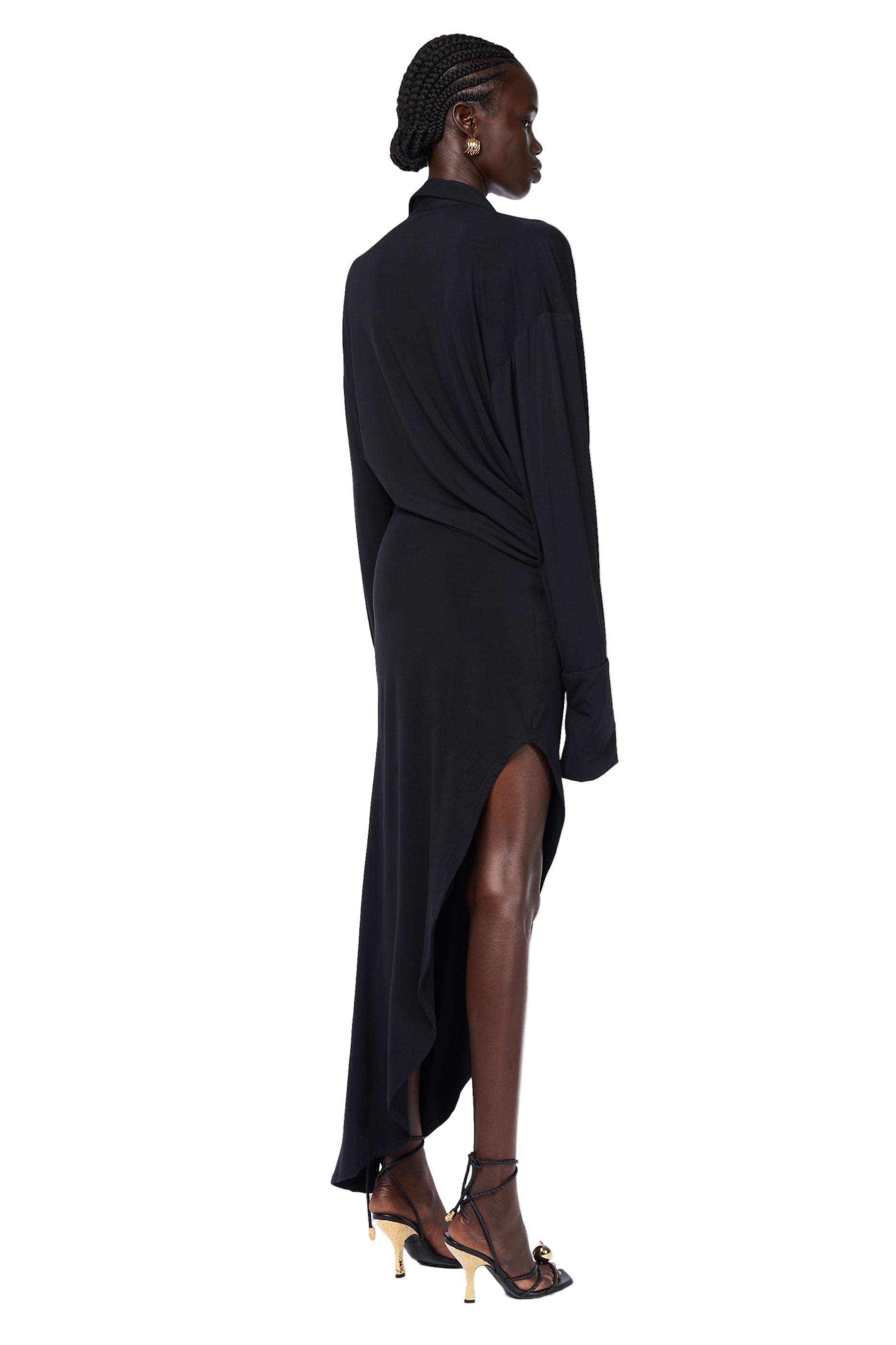 Black dress with draped design and asymmetrical slant — Lama Jouni